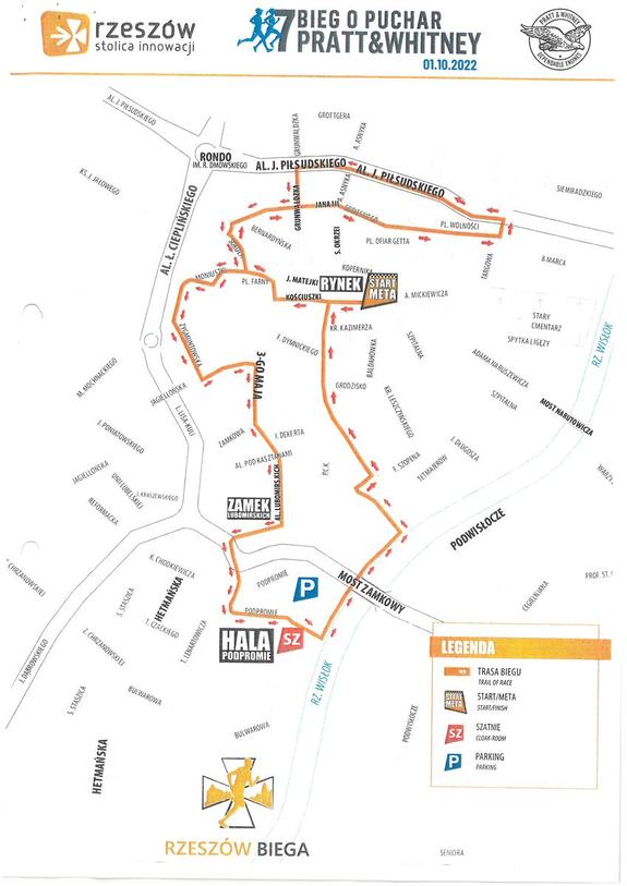 Na zdjęciu trasa maratonu naniesiona na plan ulic Rzeszowa Trasa została zaznaczona kolorem pomarańczowym, a strzałki w kolorze czerwonym wskazują kierunek biegu zawodników. Na planie zaznaczono start, metę, szatnie, parkingi.