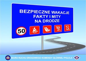 Na zdjęciu niebieski, prostokątny znak drogowy z napisem Bezpieczne Wakacje, Fakty i Mity na Drodze