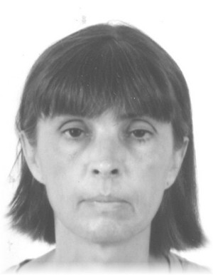 zdjęcie twarzy kobiety zaginionej, oczy ciemne, włosy średniej długości - ciemne.