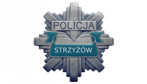 Emblemat policyjny w kształcie gwiazdy z napisem POLICJA, poniżej napis STRZYŻÓW na niebieskiej szarfie.
