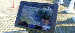 Na zdjęciu monitor pokazujący obraz z policyjnego drona