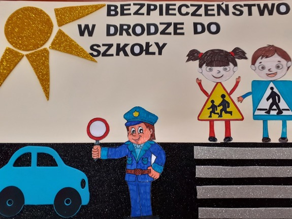 Na zdjęciu jest praca plastyczna, na której znajduje się słońce, samochód, policjant, dwójka dzieci, przejście dla pieszych i napis bezpieczeństwo w drodze do szkoły