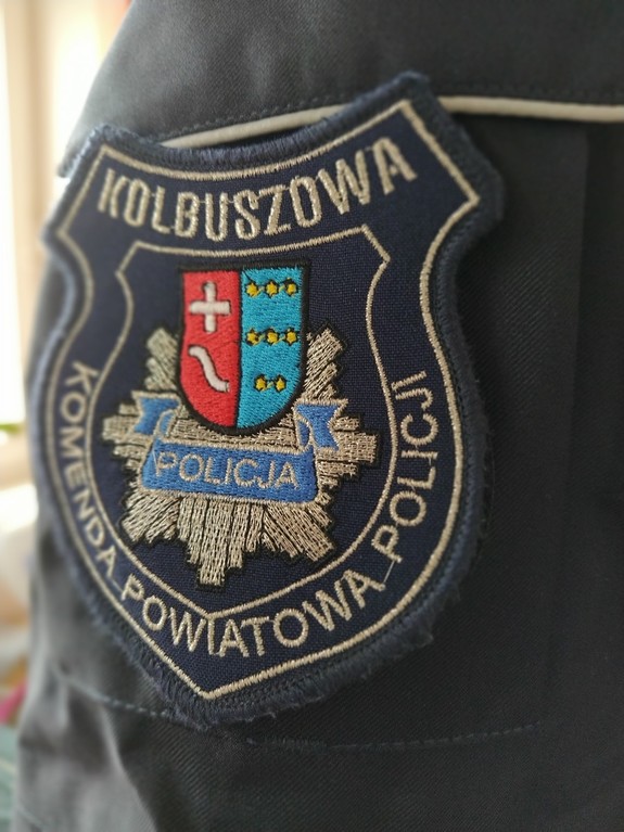 logo z gwiazdą policyjną i herbem powiatu kolbuszowskiego