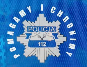 Na zdjeciu logo policji i napis policja pomagamy i chronimy.