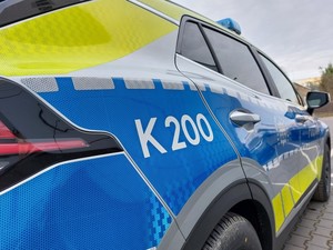 policyjny radiowóz z numerem taktycznym K 200