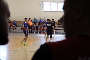 Zdjęcia z turnieju eliminacyjnego, na którym są zawodnicy i organizatorzy