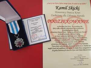 Medal wraz z legitymacją oraz podziękowanie od dyrektora RCKiK Rzeszów