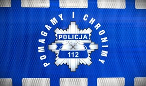 Policyjna gwiazda z napisem pomagamy i chronimy