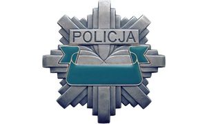 odznaka policyjna - gwiazda w kolorze srebrnym z napisem policja